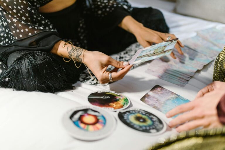 A woman performing a tarot reading with cards, conveying a mystical and spiritual atmosphere.