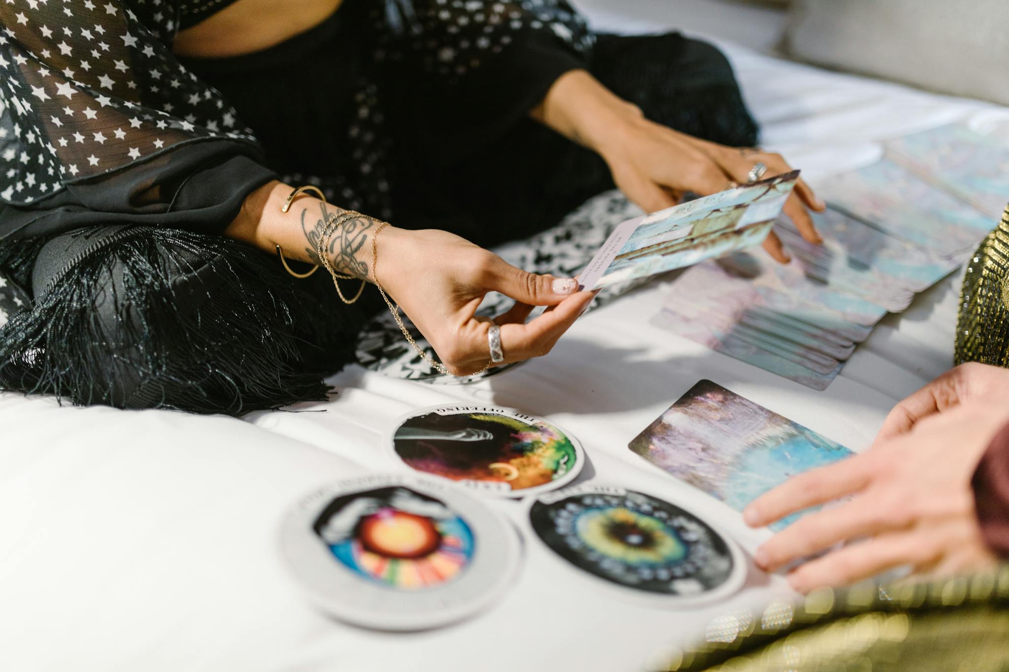 A woman performing a tarot reading with cards, conveying a mystical and spiritual atmosphere.